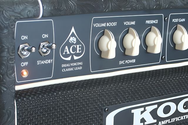 The engraved control panel of a Kool ACE with cream knobs and toggle switches